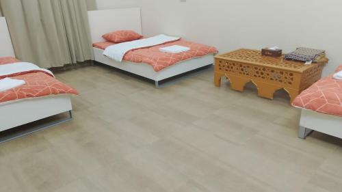 Postelja oz. postelje v sobi nastanitve Afaq guest house