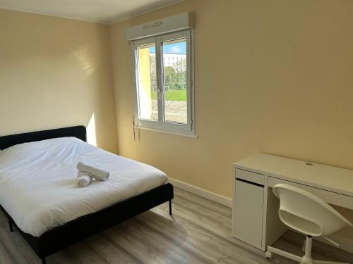 Кровать или кровати в номере F4 lumineux proche Gare et centre ville