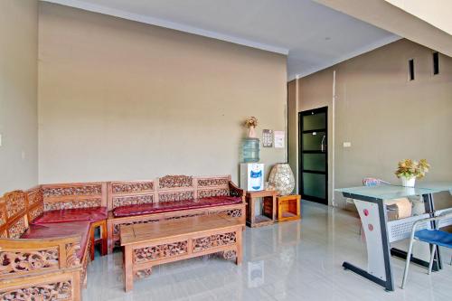 Гостиная зона в Hotel O Penginapan Noer Syariah
