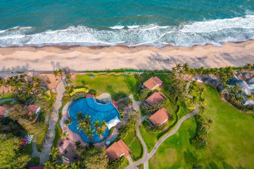 an aerial view of a resort near the beach at Radisson Blu Resort Temple Bay Mamallapuram in Mahabalipuram