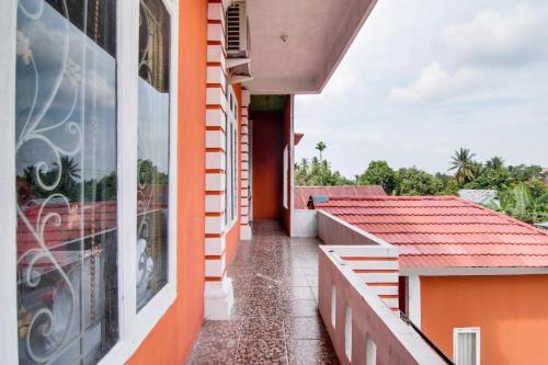 Μπαλκόνι ή βεράντα στο Hotel O Nirvana Homestay Syariah