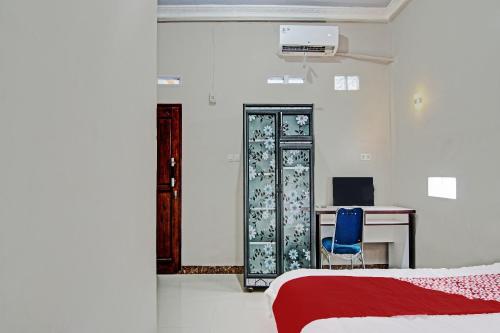 Postel nebo postele na pokoji v ubytování Hotel O Elisa Hill