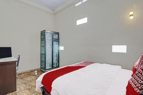 Postel nebo postele na pokoji v ubytování Hotel O Elisa Hill