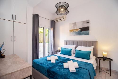 En eller flere senge i et værelse på Villa Margarita