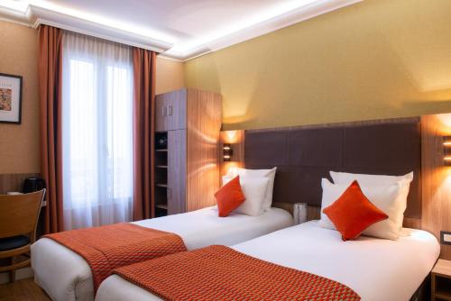 Una cama o camas en una habitación de Hotel Cactus
