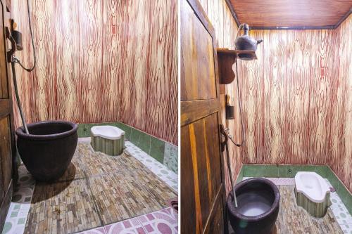 a bathroom with a toilet and a bath tub at OYO 92083 Lailik Gilang Guesthouse in Watukarung