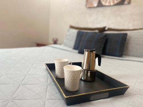Ένα ή περισσότερα κρεβάτια σε δωμάτιο στο Appartement près de Novotel face au parc WELCOME STAY
