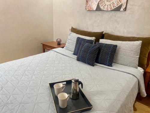 Ένα ή περισσότερα κρεβάτια σε δωμάτιο στο Appartement près de Novotel face au parc WELCOME STAY