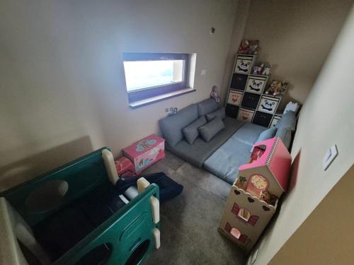 an overhead view of a living room with a couch at Vila LiMi in Oščadnica