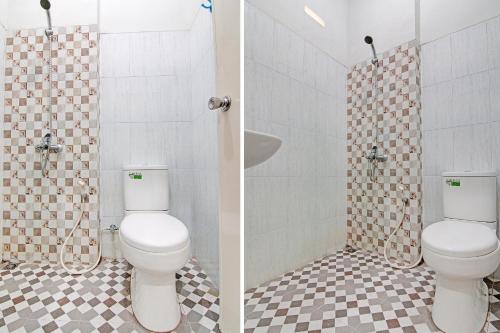 a bathroom with a toilet and a shower at Hotel O Sandira Syariah in Dumai