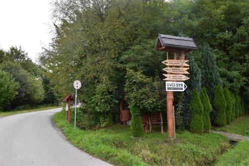 a sign on the side of a road at Vila LiMi in Oščadnica
