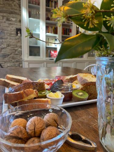 a plate of bread and pastries on a table at La Lupa e l'Orso in Berceto