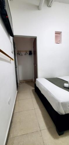 Ένα ή περισσότερα κρεβάτια σε δωμάτιο στο Apartahotel hm caribe