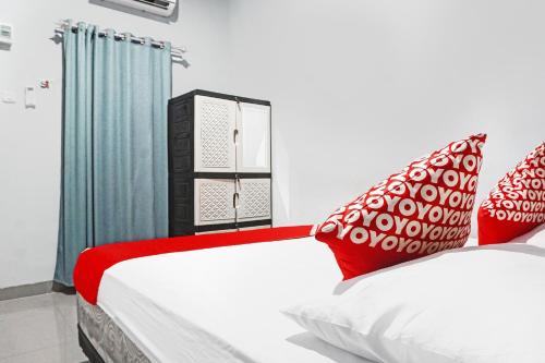 Katil atau katil-katil dalam bilik di Hotel O Pondok Cahaya
