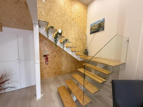a staircase in a room with a wall at Porto Encanto- 7 Bedrooms in Porto