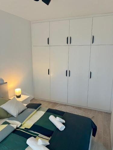 Postel nebo postele na pokoji v ubytování Quality apartman