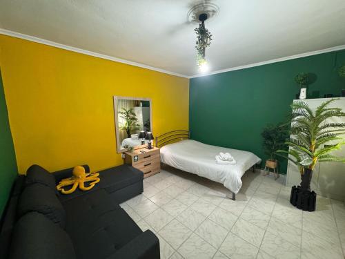 Postel nebo postele na pokoji v ubytování Tropical studio - myHomee