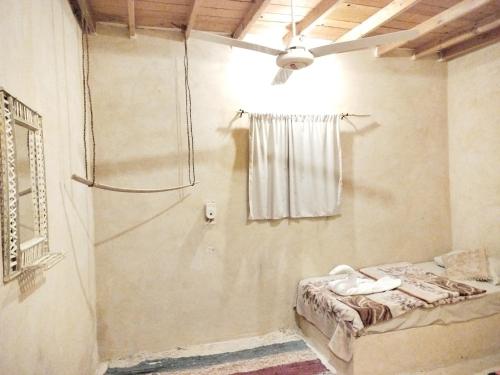 Ένα ή περισσότερα κρεβάτια σε δωμάτιο στο Wenarose house