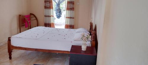 Ένα ή περισσότερα κρεβάτια σε δωμάτιο στο House Randil
