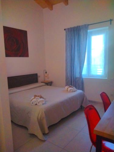 Postel nebo postele na pokoji v ubytování Coliving Giulia