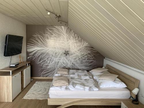 Postel nebo postele na pokoji v ubytování Ferienwohnung Gehring Bad Krozingen
