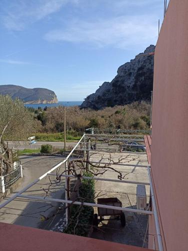 a view of a parking lot with a view of the ocean at Vila Marina in Buljarica