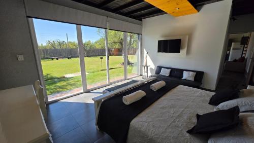 Postel nebo postele na pokoji v ubytování OlivaNegra Resort - Oliva3