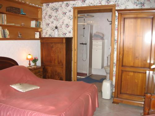 Postel nebo postele na pokoji v ubytování L'ore Du Bois - Maison D'hôtes