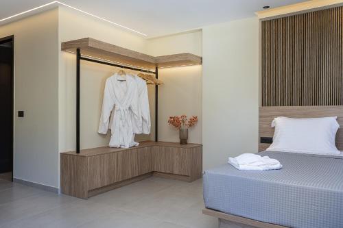Ένα ή περισσότερα κρεβάτια σε δωμάτιο στο Elmima Luxury Villa