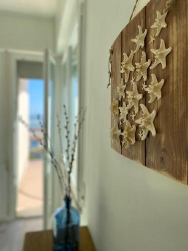 a painting of stars on a wall in a room at La Corte Dei Mari Acquamarina in Cesenatico