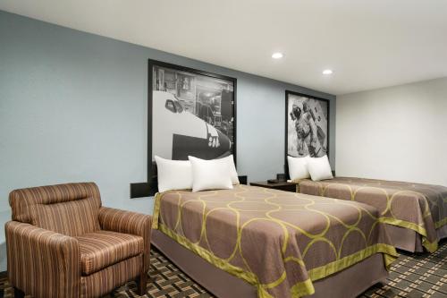 Katil atau katil-katil dalam bilik di Crystal Inn Northeast Houston Downtown I-610
