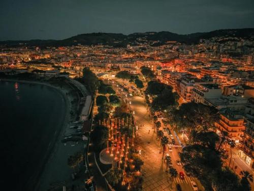 a view of a city at night with lights at sole e mare nel cuore di R C in Reggio Calabria