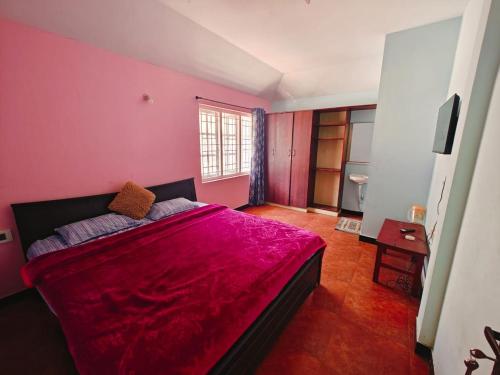 Postel nebo postele na pokoji v ubytování Lakshmi cottage