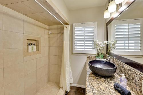 a bathroom with a sink and a shower at 4 Mi to Dtwn Riverside Gem with Pool and Game Room in Riverside