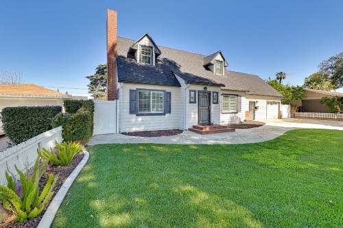 a house with a yard with green grass at 4 Mi to Dtwn Riverside Gem with Pool and Game Room in Riverside