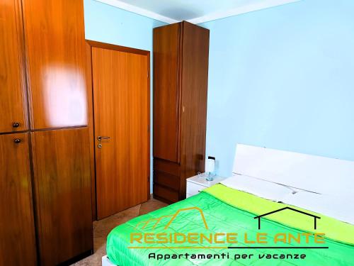 Katil atau katil-katil dalam bilik di Residence Le Ante