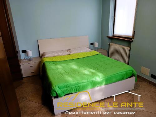 Katil atau katil-katil dalam bilik di Residence Le Ante