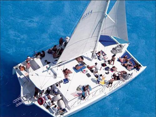 a group of people on a sail boat in the water at Skyline Suites Villa and Spa in Montego Bay