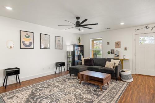 a living room with a couch and a table at Caroline in Granbury