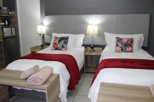 Ένα ή περισσότερα κρεβάτια σε δωμάτιο στο Cronin Luxury Accomodation Room 3
