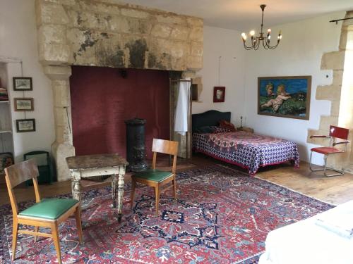 Ένα ή περισσότερα κρεβάτια σε δωμάτιο στο Grande chambre renaissance