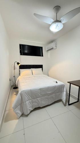 Postel nebo postele na pokoji v ubytování Kitnet Residencial Ebenézer