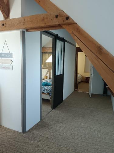 Postel nebo postele na pokoji v ubytování Gîte de l'oeillet