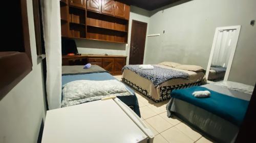 Кровать или кровати в номере Casa do Ivo Pousadas - Soft