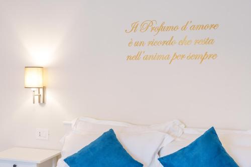 Postel nebo postele na pokoji v ubytování Relais Villa Rizzi