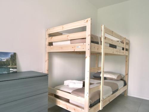 a bunk bed room with two bunk beds at La Rocca - terrazza panoramica in Darfo