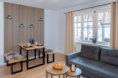 Χώρος καθιστικού στο Marktplatz-Flair mit Dachterrasse im Zentrum