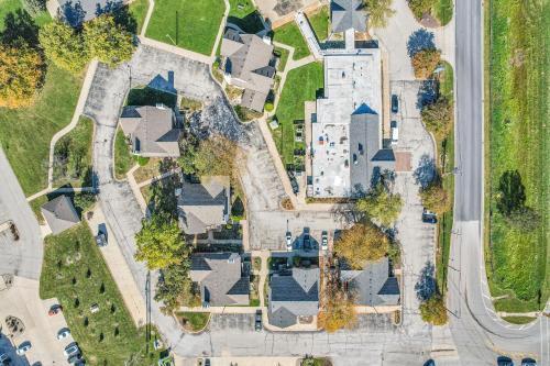 an overhead view of a house with roofs at Eastlake Suites Hotel & Conference Center By OYO Urbana in Champaign