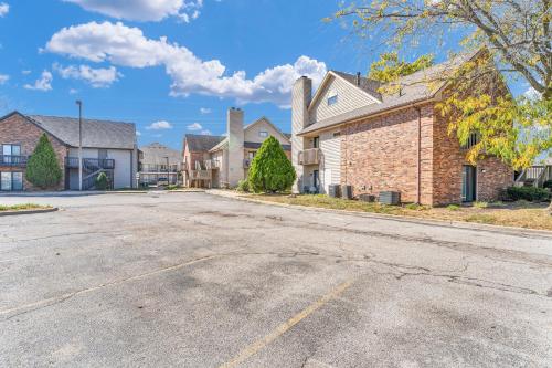 an empty street in a residential neighborhood with houses at Eastlake Suites Hotel & Conference Center By OYO Urbana in Champaign