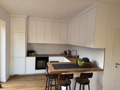 Η κουζίνα ή μικρή κουζίνα στο -33a- Exklusive FeWo Papenburg - Westoverledingen - Grenzweg -